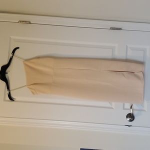 Creme asymmetrical straps knee length